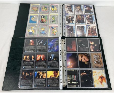 2 green foldered albums containing a quantity of assorted trading cards. To include: Batman Holo series, Marvel Masterpieces,