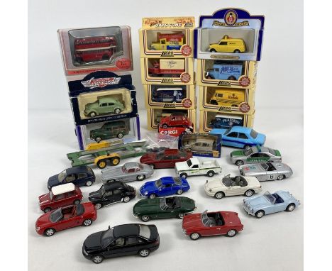 A collection of boxed and unboxed assorted diecast vehicles by Newray, Modus, Lledo and Exclusive First Editions. Examples in