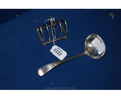 A Silver Toast Rack, London 1908, maker W.H.C. Ltd. and a Sheffield Silver 1898 Ladle