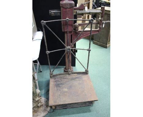 Set of large cast iron sack scales, painted in maroon