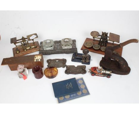 Desk accessories, to include two sets of postal scales and weights, desk stand, letter embosser, magnifying glass on stand et