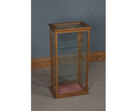 Light oak and glazed table top display cabinet, interior with five adjustable glass shelves, 77cm high, 38.5cm wide