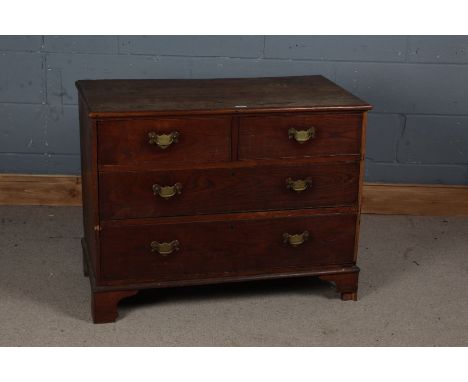 20th century elm chest of two short two long draws, with a Harvey Nichols &amp; Co Label to the back, with swan neck handles 