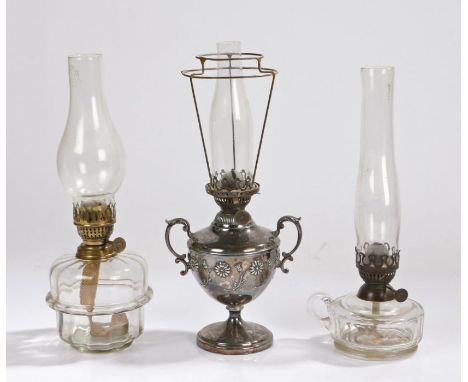 Richard Evered &amp; Sons oil lamp, with clear glass chimney and shade mount above a silver plated foliate decorated twin han