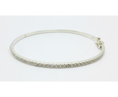 A silver and zircon bangle