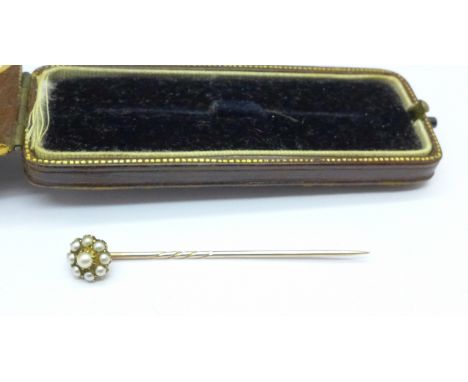 A yellow metal and pearl stick pin, 2g