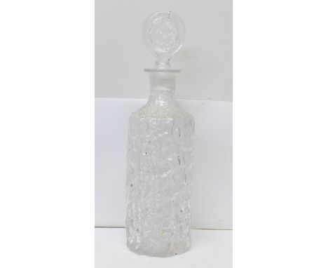 A bark effect glass decanter