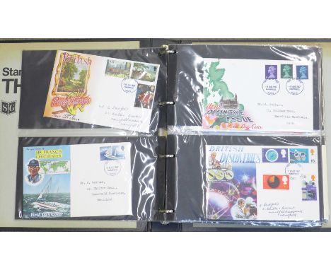An album of stamp first day covers, sixty-two in total