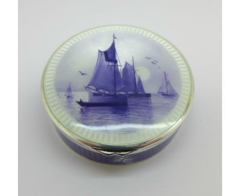 A silver and guilloche enamel patch box, London import mark for 1923, 56g, 5.5cm, (enamel chipped on the side)