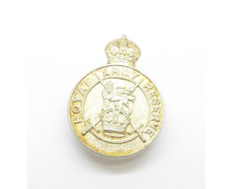 A Royal Army Reserve hallmarked silver button hole badge