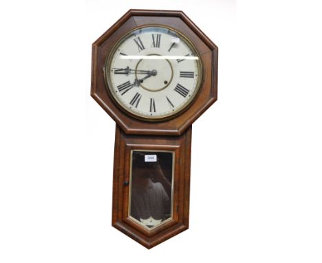 A late 19th century walnut drop dial "Canterbury" wall clock, the circular dial set with Roman numerals and glazed lower sect