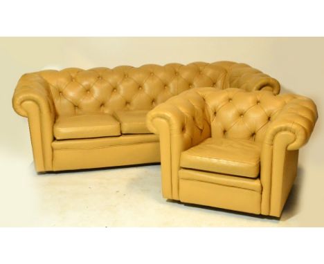 A pale tan button upholstered Chesterfield three seater settee and matching chair (2).