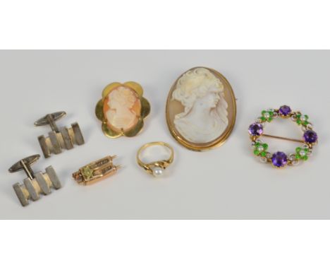 An Edwardian 9ct gold framed oval cameo brooch, a similar smaller example, a decorative ring, a pendant, a pair of silver cuf