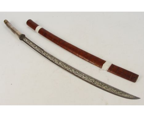 A 19th century dha, Burma/Myanmar, with etched curved blade and floral detailed grip and with wooden scabbard, lacking tip of