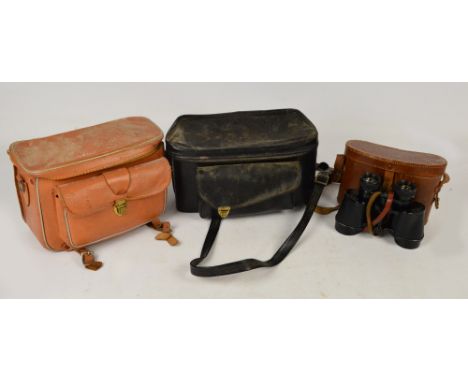 A cased pair of Denhill 12x40 wide angle binoculars, a cased Pentax camera, an associated lens, light meter, etc.