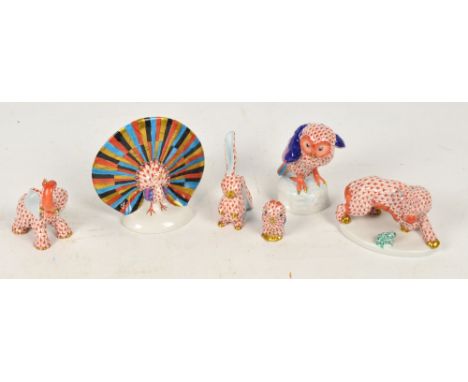 Six Herend figures; owl, peacock, dog with frog, elephant, small owl and rabbit. CONDITION REPORT: Elephant has a chip to one