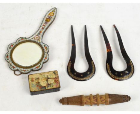 An Italian micromosaic hand mirror, length 16.5cm, a pair of tortoiseshell pique decorated hair combs, a 19th century papier-