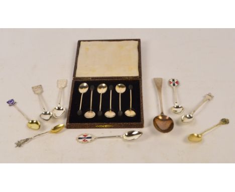 A small collection of silver spoons including a cased set of six George V hallmarked silver bean spoons, Adie Brothers, Birmi