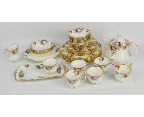 A Royal Albert "Lady Carlyle" six setting tea service and a large quantity of Royal Albert "Celebration" teaware. CONDITION R