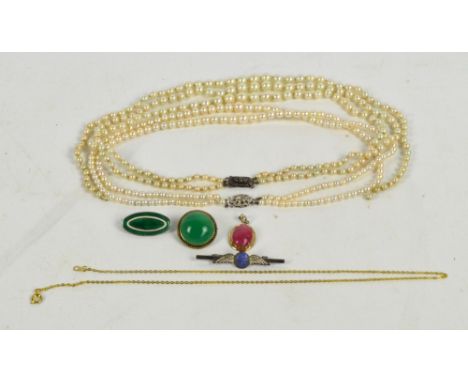 A two strand graduated pearl bead necklace with 9ct white gold clasp, a further simulated pearl three strand necklace with ma