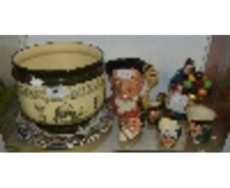 A collection of Royal Doulton including a Bayeux Tapestry jardinière, a large character jug; D6570 "Gaoler", three plates, HN