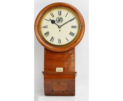 GWR; a rare mahogany single fuse railway drop dial wall clock, the circular painted dial set with Roman numerals inscribed "G