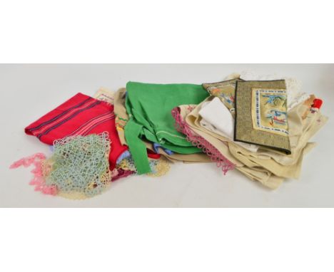A quantity of vintage textile items, mainly embroidered including broderie anglaise underwear, cloths, aprons, lace edging, e