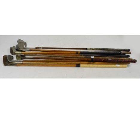 Ten hickory shafted golf clubs including a Zenith niblick, a Mashie niblick, a Model A Rainford North Shore aluminium headed 