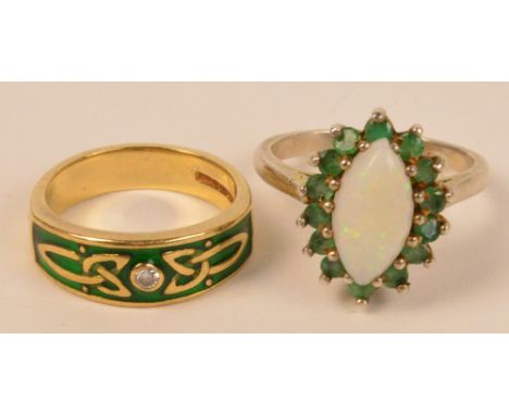 A 9ct gold diamond and green enamelled ring with Celtic style decoration, size I/J, and a dress ring centred with an opal (2)