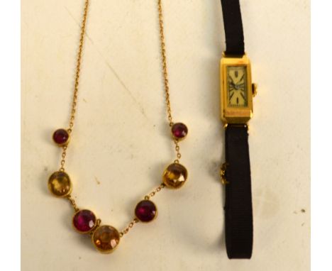 An 18ct yellow gold cased Art Deco style manual wind lady's cocktail wristwatch, the rectangular dial set with button numeral
