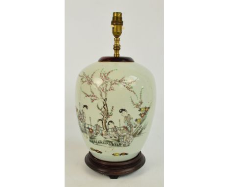 A large Chinese ginger jar/lamp stand, painted in enamels with a figural garden scene and with artist's colophon, height 31.5