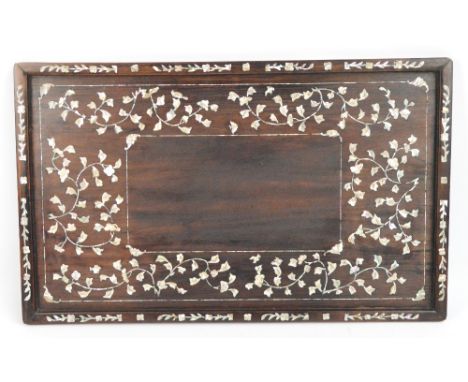 A 19th century hardwood rectangular tray with mother of pearl inlaid foliate sprays and with bat to each corner, 56 x 34.5cm.