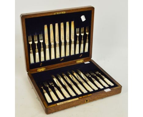 A set of twelve Victorian hallmarked silver bladed and mother of pearl handled fruit knives, length 18.5cm and forks, Mappin 