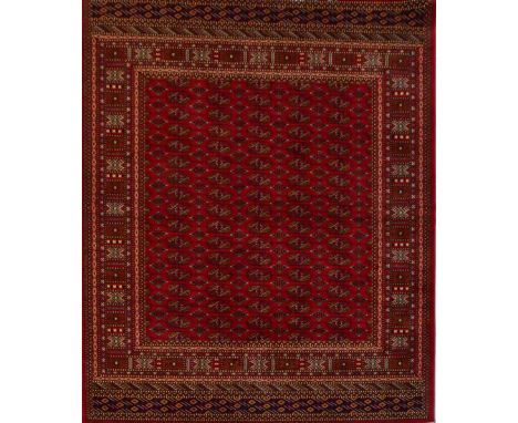 A red ground Bokhara carpet, 230 x 160cm.