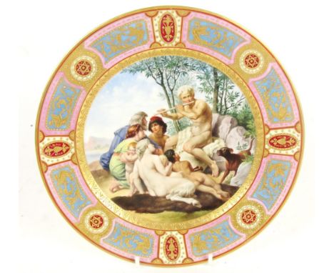 A late 19th century Vienna hand painted cabinet plate depicting a mythological scene with fawn playing a flute within a gilt 