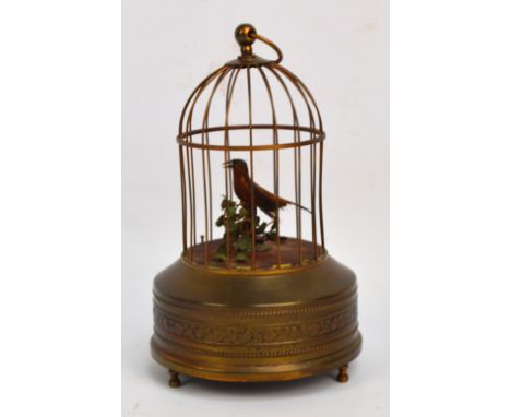 An early 20th century clockwork birdcage automaton, height 25cm. CONDITION REPORT: Some tarnishing to metal. Discolouration t
