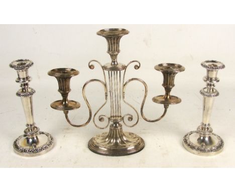 A silver plated twin branch three light candelabrum with central lyre shaped stem and spreading oval foot, height 32cm, and a