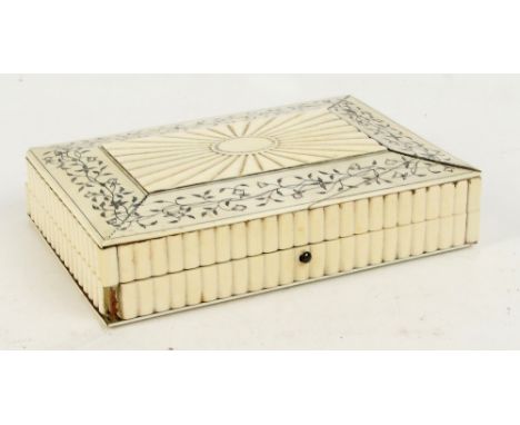 A 19th century ivory and pen work decorated rectangular trinket box with floral decorated panel, push button lock, and sandal