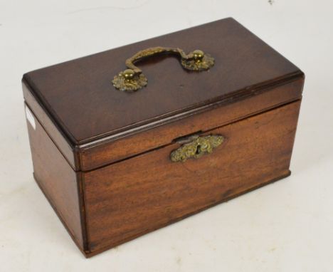 A George III mahogany tea caddy, the hinged lid with gilt metal central handle enclosing three lidded canisters, width 26cm.