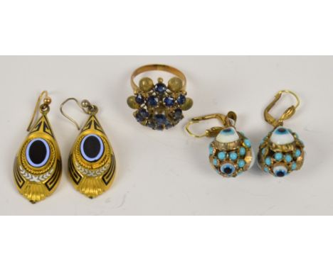 A yellow metal ring with a cluster of blue stones, shank marked 18K, size N/M, a pair of yellow gold globular earrings set wi