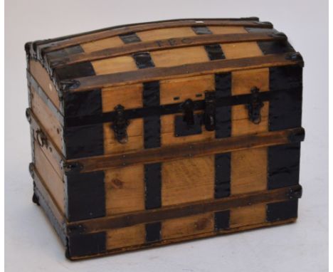 A strapwork dome topped trunk, length 76cm.