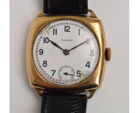 ROLEX; a gentleman's vintage 9ct gold cased wristwatch, the circular white enamel dial set with Arabic numerals and subsidiar