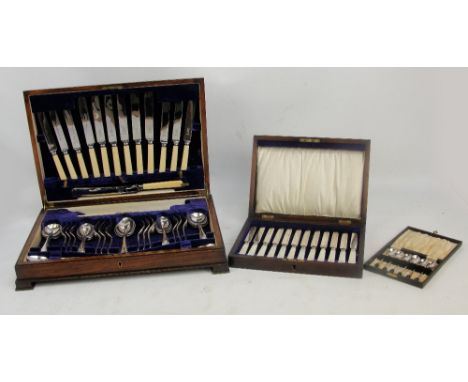 A mahogany cased canteen of plated cutlery, a cased set of six plated coffee spoons with bean finials and a cased set of twel