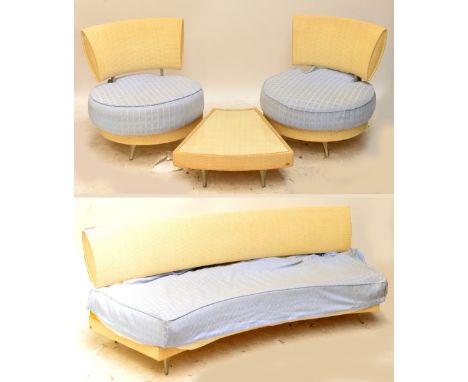 PIERANTONIO BONACINA; a 1970s four piece canework suite with aluminium frame and pale blue upholstery comprising curved sette