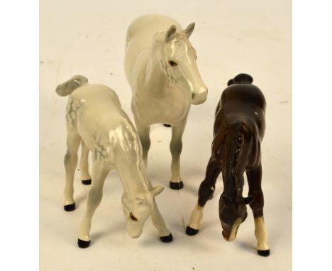 Two Beswick figures of horses; model no.1992 "Thoroughbred Stallion (small)" and model no.946 "Foal (grazing)", and an identi