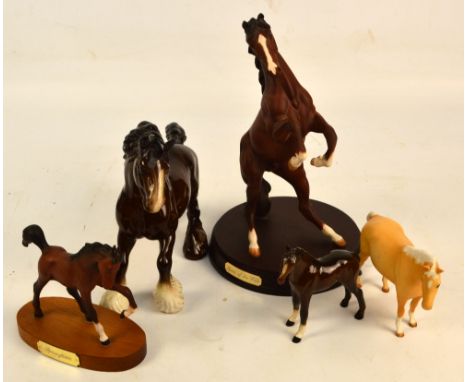 Four Royal Doulton figures of horses, to include "Spirit of the Wild" and "Springtime", also a Beswick matt glazed figure, mo