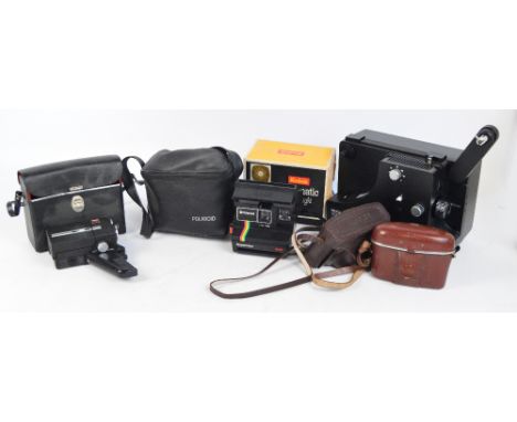 A collection of mid 20th century cameras and camera equipment including cased Ilford and Kodak cameras, a Kodak cine camera, 