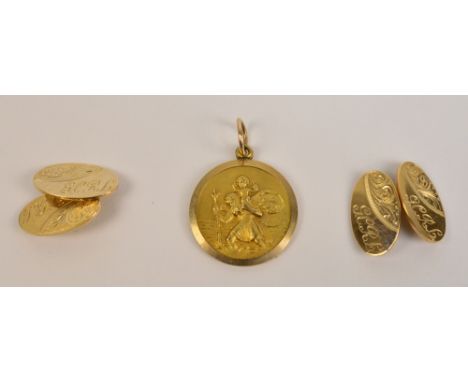 A pair of 9ct yellow gold cufflinks, engraved with foliate scrolls and initials, Sheffield 1983, and a yellow gold pendant de