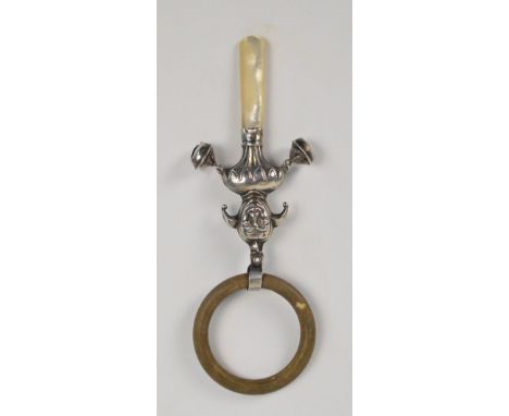 A George V hallmarked silver rattle with mother of pearl teether and body modelled as a jester, Crisford & Norris Ltd, Birmin