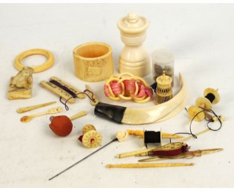 A collection of ivory, bone and similar items including a pepper grinder, a Schweppes advertising bowls measure, a small bang